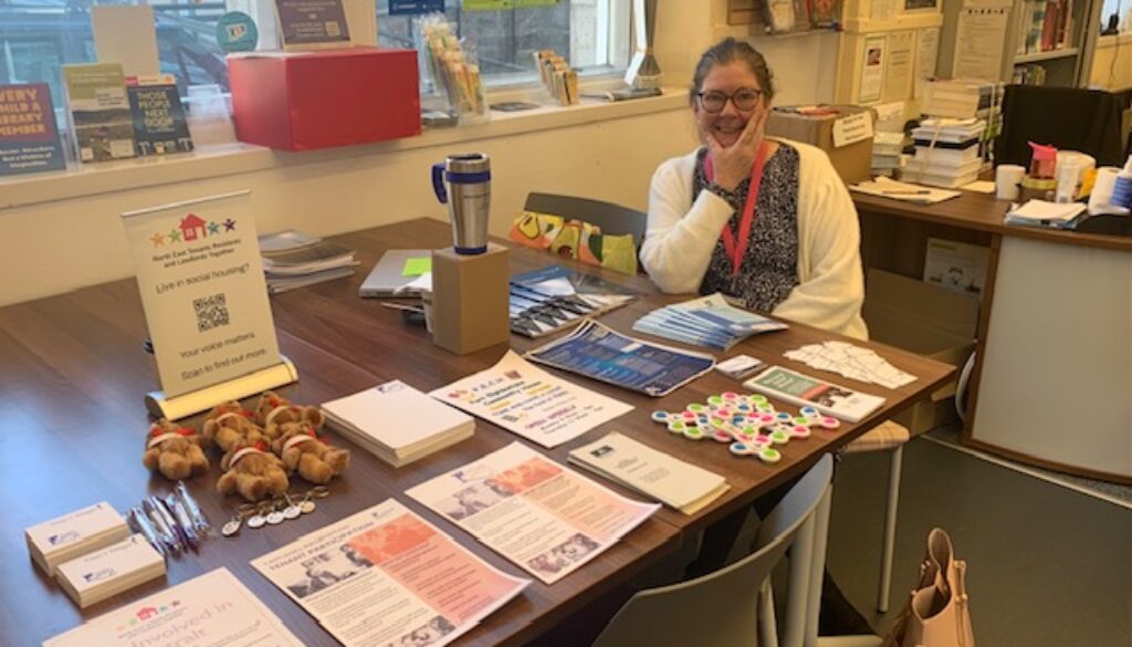 A NETRALT member smiling at a tenant participation pop up event in Inverurie