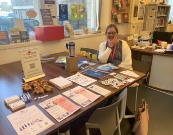 A NETRALT member smiling at a tenant participation pop up event in Inverurie