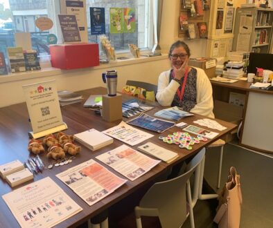 A NETRALT member smiling at a tenant participation pop up event in Inverurie