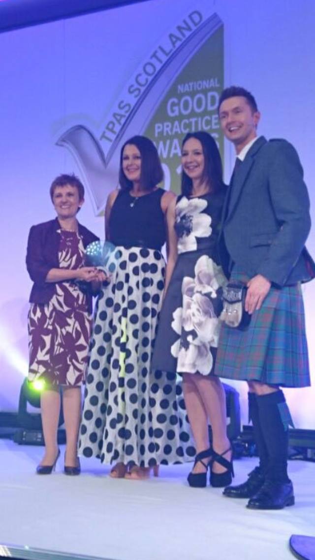 Collecting award at TPAS