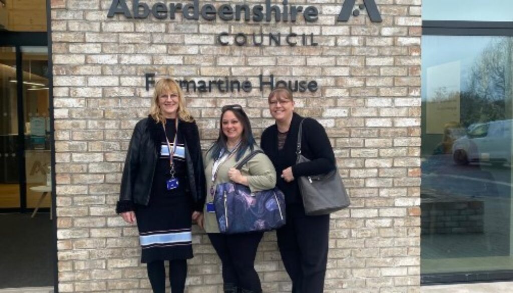 3 NETRALT colleagues standing outside Formartine House