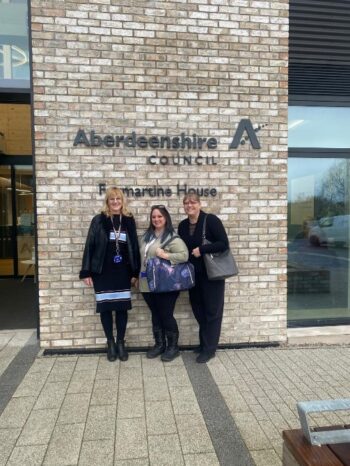 3 NETRALT colleagues standing outside Formartine House
