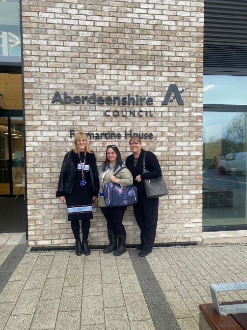 3 NETRALT colleagues standing outside Formartine House